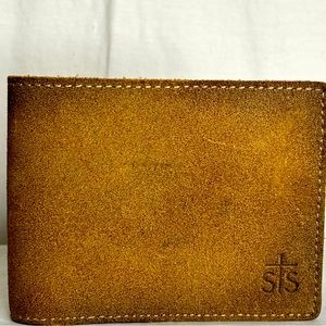 STS Ranch, men’s leather, bifold wallet, in good condition.